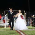 Key West High School’s 2017 Homecoming - Michael Quinlivan et al. standing on top of a grass covered field - Amber Acevedo