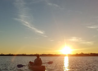 kayaking at sunset