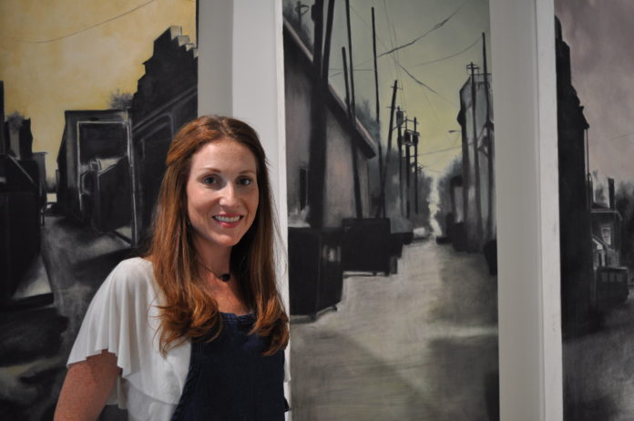 Gallery opens tonight in Morada Way - A person smiling for the camera - Building