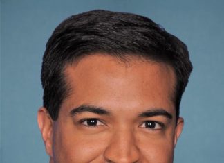 Don’t forget to file for hurricane tax relief - Carlos Curbelo wearing a suit and tie smiling and looking at the camera - Carlos Curbelo