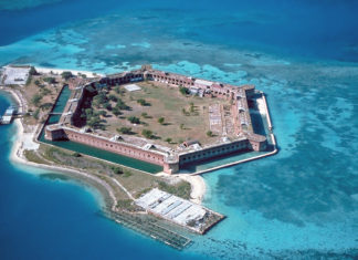 NEW INITIATIVES SUGGESTED FOR HURRICANE DEBRIS REMOVAL - A large pool of water - Fort Jefferson