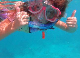 What’s your kid doing this summer? - A person swimming in a pool of water - Snorkeling
