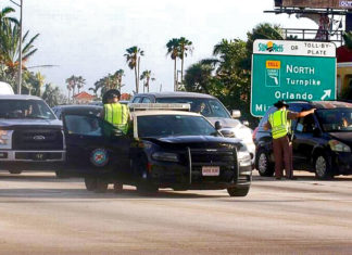 Learning process - A police car parked on a city street - Florida Keys
