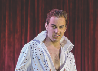 Baby, You Were Born This Way - A man standing in front of a curtain - The Greatest Showman