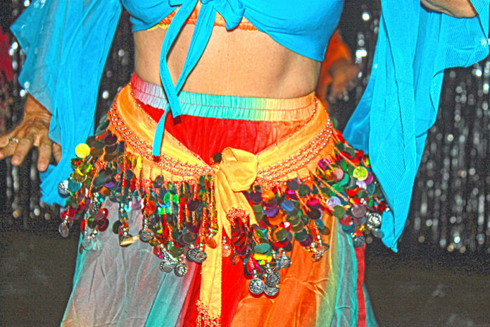 A decade of dance - A person wearing colorful clothes - Abdomen