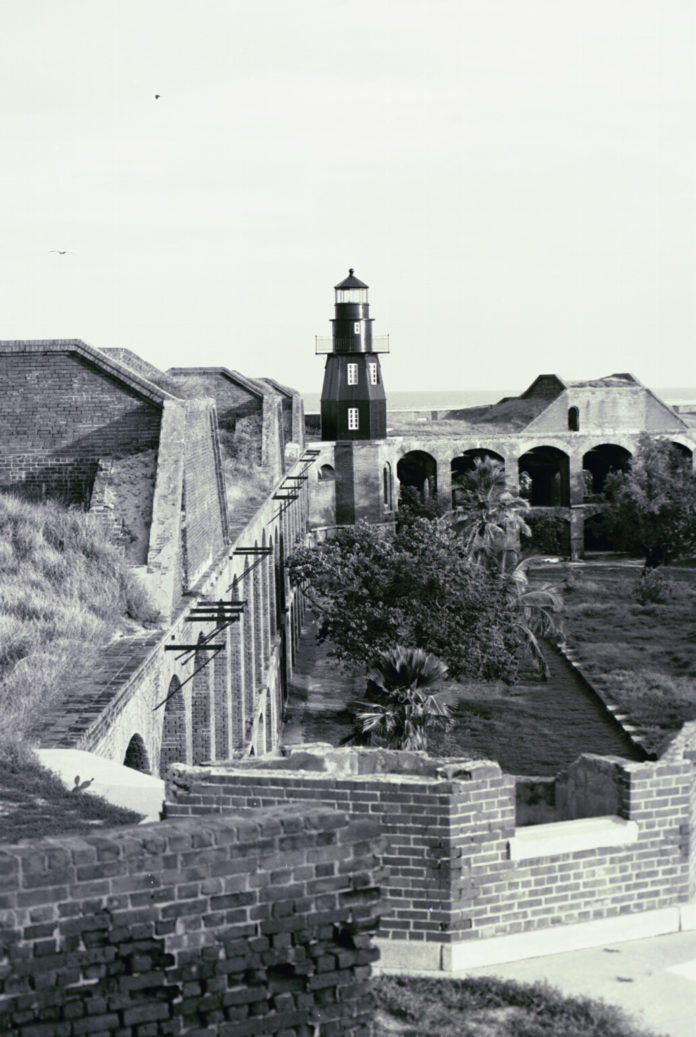 THE LIGHTHOUSE - A vintage photo of an old building - History