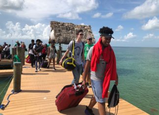 Come visit – Pigeon Key is open for business - A group of people standing on top of a suitcase - Florida Keys