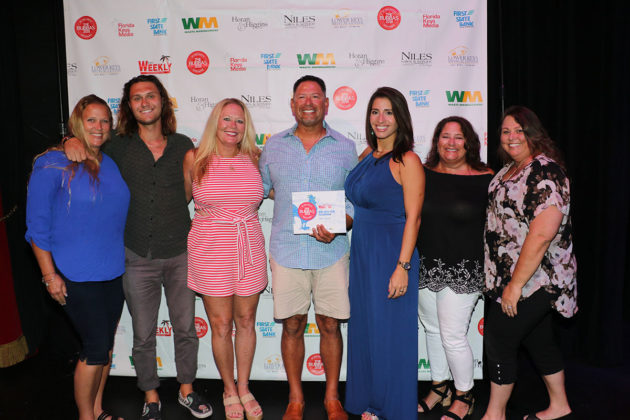 And the Winners Are! - A group of people posing for a photo - Key West Theater