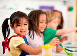 Calling all 4-year-olds – Enrollment open for Keys pre-kindergarten - A little girl sitting at a table - Kids Learning Path
