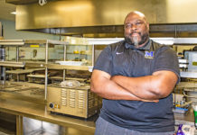 ‘Chef Flavor’ Stanton teaches kids to cook - A man cooking in a kitchen - Chef