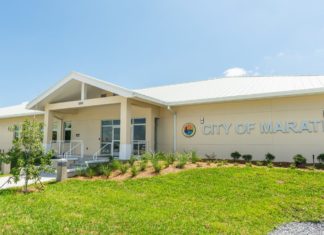 REORGANIZATION AT MARATHON CITY HALL - A large lawn in front of a house - Florida Keys