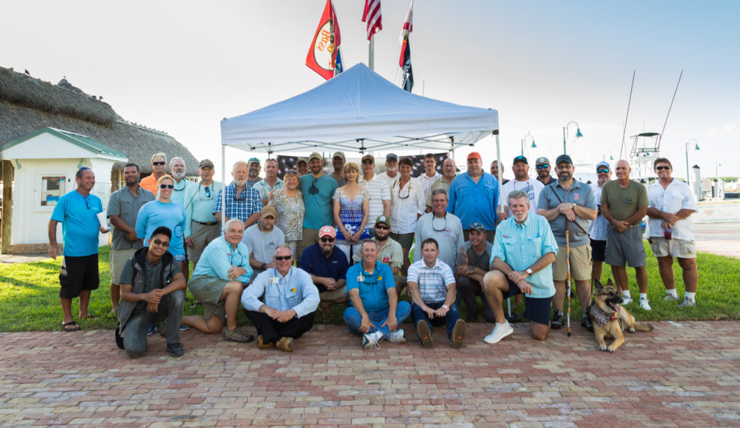 25 Disabled Veterans Are Honored - A group of people posing for a picture - Florida Keys