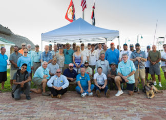 25 Disabled Veterans Are Honored - A group of people posing for a picture - Florida Keys