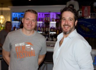 7th annual Key West Film Festival - A man standing in front of a group of people posing for the camera - T-shirt