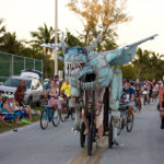 Zombie Invasion - A group of people riding on the back of an elephant - Bicycle