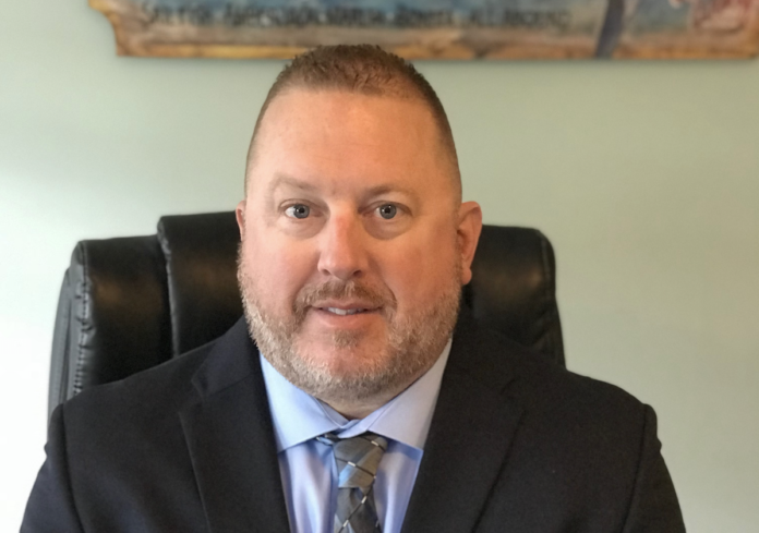 20 Q’s With Richard Malafy:  Keys Attorney Opens Up on Work Ethic, Fishing and Pro Bono Causes - A man wearing a suit and tie - Richard A. Malafy