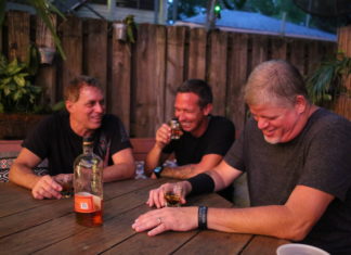 Together Again – Nick Norman Band kicks off First Flight’s music season - A group of people sitting at a table - Caffeine Carl Wagoner