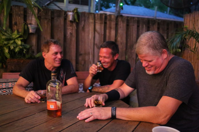 Together Again – Nick Norman Band kicks off First Flight’s music season - A group of people sitting at a table - Caffeine Carl Wagoner