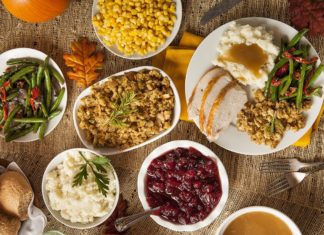 Thanksgiving guide – Where to volunteer, or find a turkey dinner - A bowl filled with different types of food on a table - Thanksgiving dinner