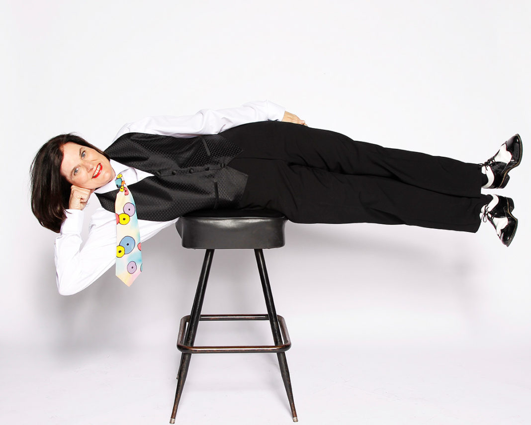 Wait, Wait…It’s Paula Poundstone - A person sitting in a chair - Paula Poundstone