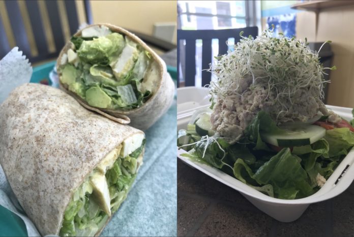 Eco Eats offers wraps, pitas and more - A plate of food with a sandwich and a salad - Vegetarian cuisine