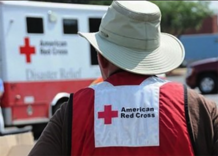 American Red Cross still handing out Irma funds - A person wearing a hat - American Red Cross