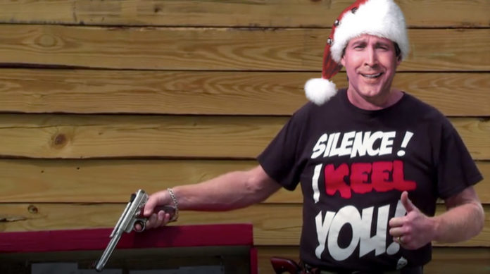 CLARK W. GRISWOLD: The Exclusive Holiday Interview ‘ - Chevy Chase holding a sign - Florida Keys