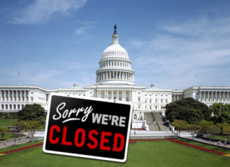 Top 10 Signs the Federal Government is Shut Down in the Keys - A sign in front of a building - United States Capitol