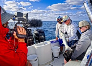 Local Marathon Anglers Featured on Syndicated Show - A group of people on a boat - Boat