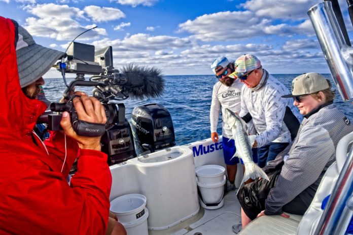 Local Marathon Anglers Featured on Syndicated Show - A group of people on a boat - Boat
