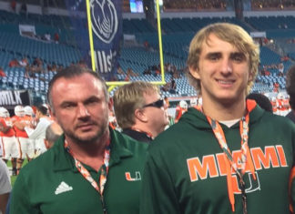 Coral Shores Football Standout Signs With THE U - A group of people posing for the camera - University of Miami