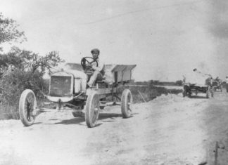 DRIVING THE KEYS – Upper Keys History - A vintage photo of a man driving a car - Florida Keys