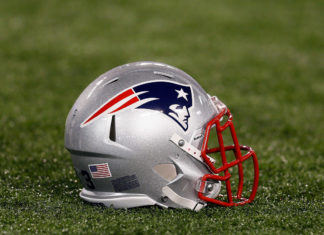 Top 10 Signs You Are Pulling For the Patriots in the Super Bowl - A close up of a football field - New England Patriots