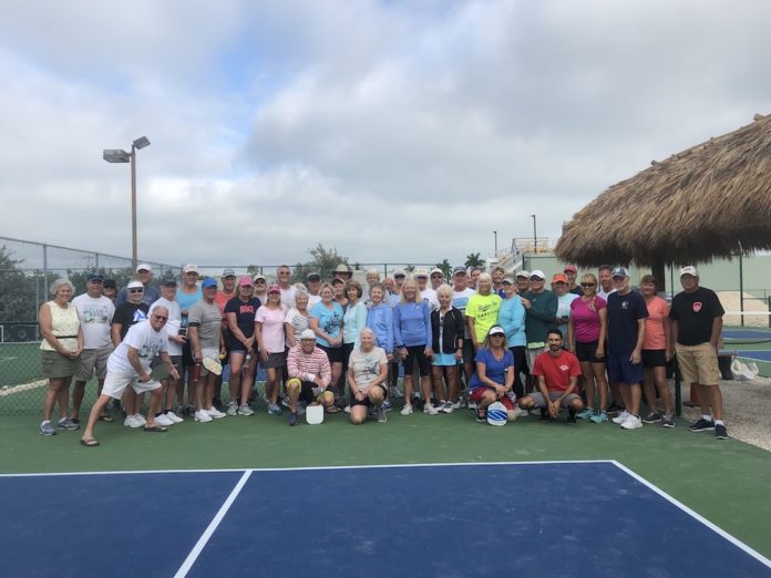 KCB pickleball players raise funds for new courts - A group of people on a court - Florida Keys