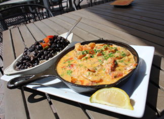 Keys Eats: Ballyhoo’s Offers Great Seafood With a Side of Southern Hospitality - A pizza sitting on top of a plate of food - Vegetarian cuisine