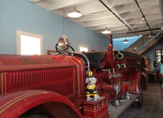 The Bucket List – Local Picks for Best of Key West - A red and black truck sitting on top of a table - Key West Firehouse Museum