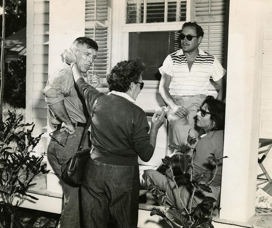 Celebrating Tennessee Williams: Events will Offer Cocktails, Movies, Books and More! - Tennessee Williams et al. standing in front of a building - Tennessee Williams