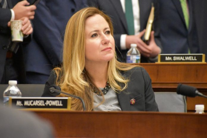 Notes from the Hill: Rep. Debbie Mucarsel-Powell gives the Weekly a report on the action in D.C. - A woman talking on a cell phone - Debbie Mucarsel-Powell