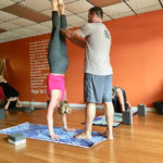 Males in Yoga increase in the Upper Keys - A group of people standing in a room - Yoga
