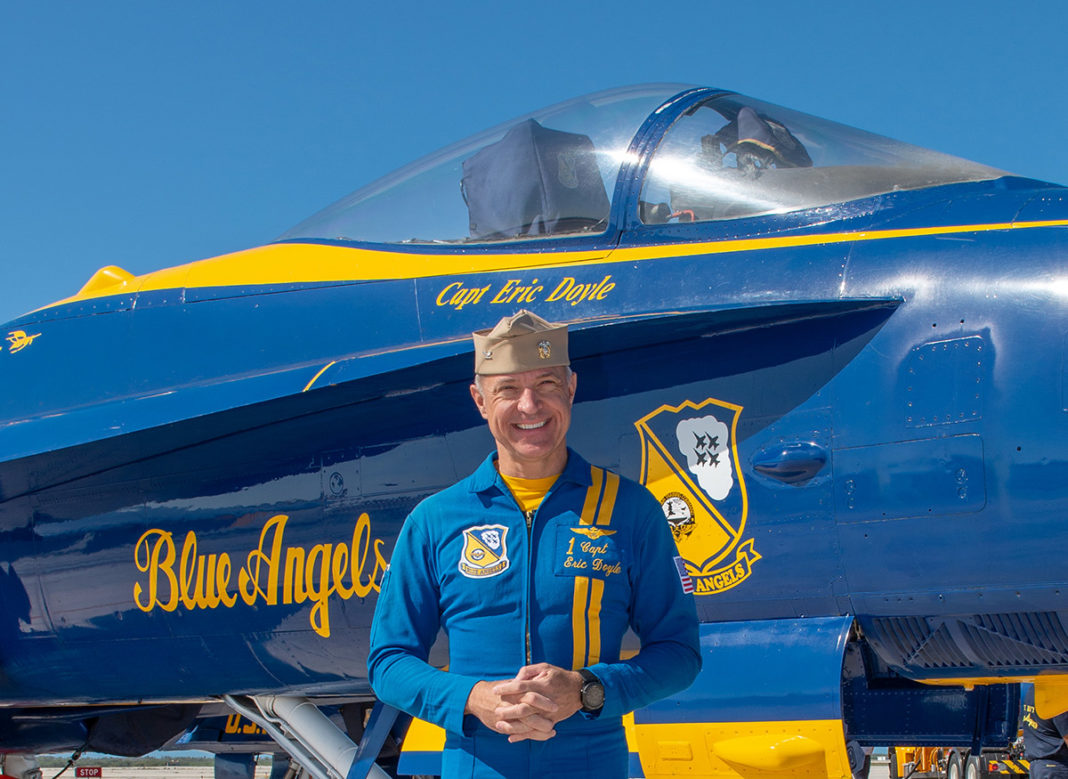 Exclusive Interview with a Blue Angel - A man standing in front of a plane - Blue Angels