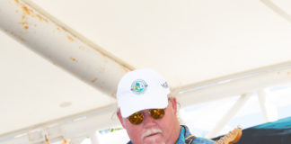 Locals, visitors devour the seafood - A person holding a baseball bat - Florida Keys