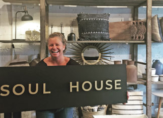 Soul House Collaborative Grand Opening - A person holding a sign - Key West