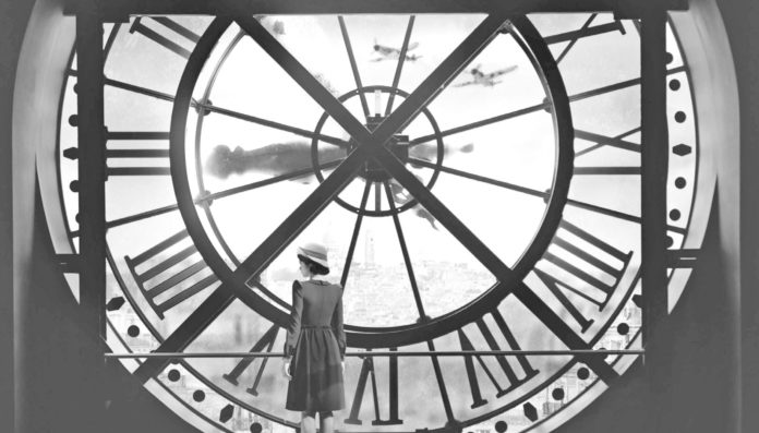 ‘The Lost Girls Of Paris’ Goes Back in Time – Author Pam Jenoff speaks at Books & Books April 17 - A close up of a giant clock - The Lost Girls of Paris