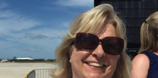 Linda Russin made the airwaves personal - A woman wearing sunglasses posing for the camera - Sunglasses