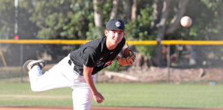 Canes baseball season hits final stretch - A baseball player throwing a ball - Pitcher