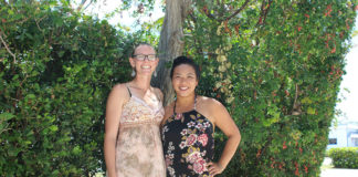 Keys newcomers making their impact - A woman standing in front of bushes - Florida Keys