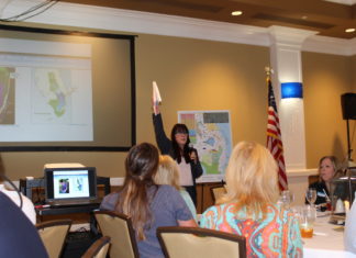 Meads ready to tackle water issues - A group of people in a room - Tavernier