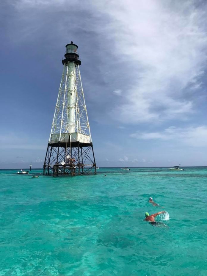 Reef Light Foundation talks mission - A large ship in a body of water - Alligator Reef Light House