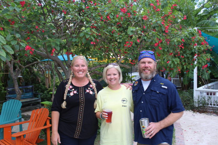 Drink Beer for a Great Cause (and it’s really tasty beer from Florida Keys Brewing Co!) - A couple of people posing for the camera - Florida Keys Brewing Co