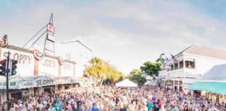 Songwriters Fest Hits Key West with Free Show by Brad Paisley - A group of people standing in front of a crowd - Key West